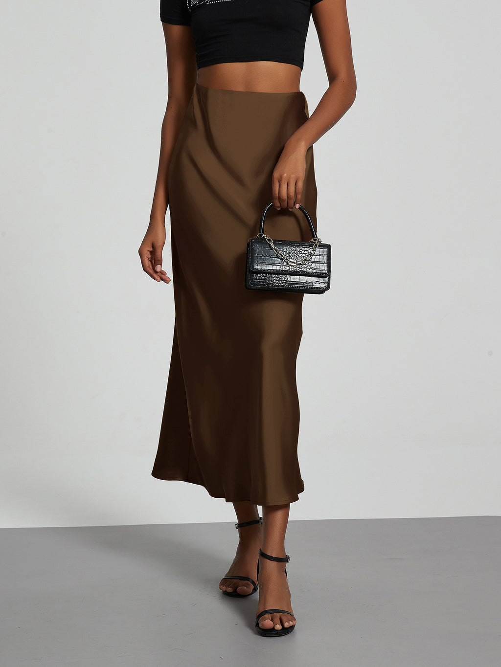 Cross-border women's clothing wholesale European and American style fashion temperament satin texture skirt Joker solid color glossy mid-length skirt